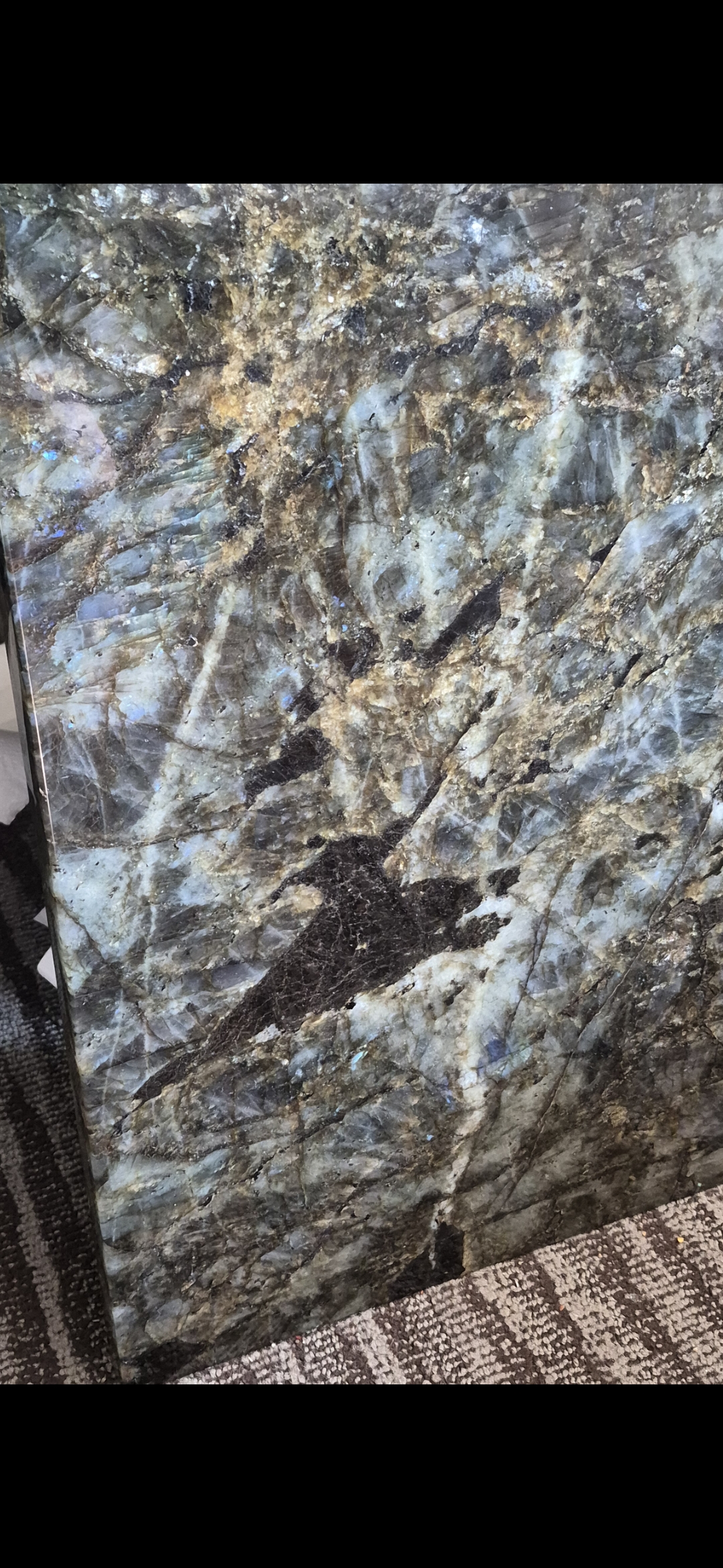 A labradorite slab with visible crystalline structure