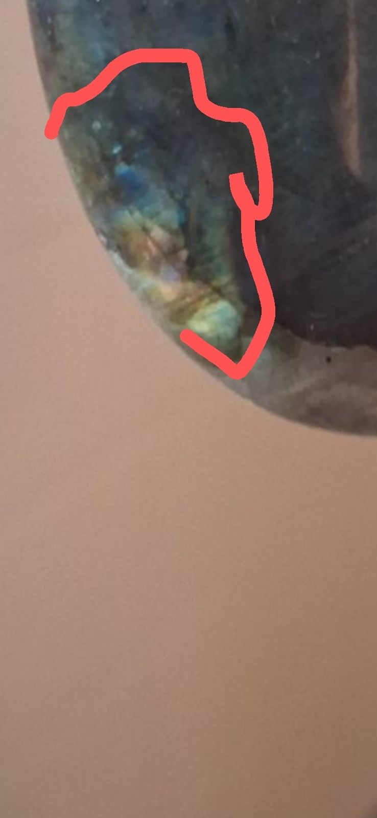 The detail, blue and gold pooled