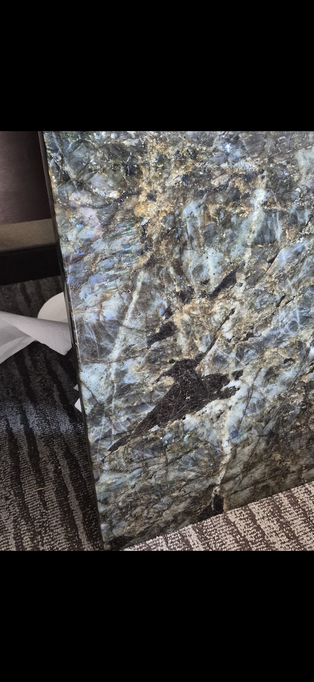 A labradorite slab, mottled blue grey