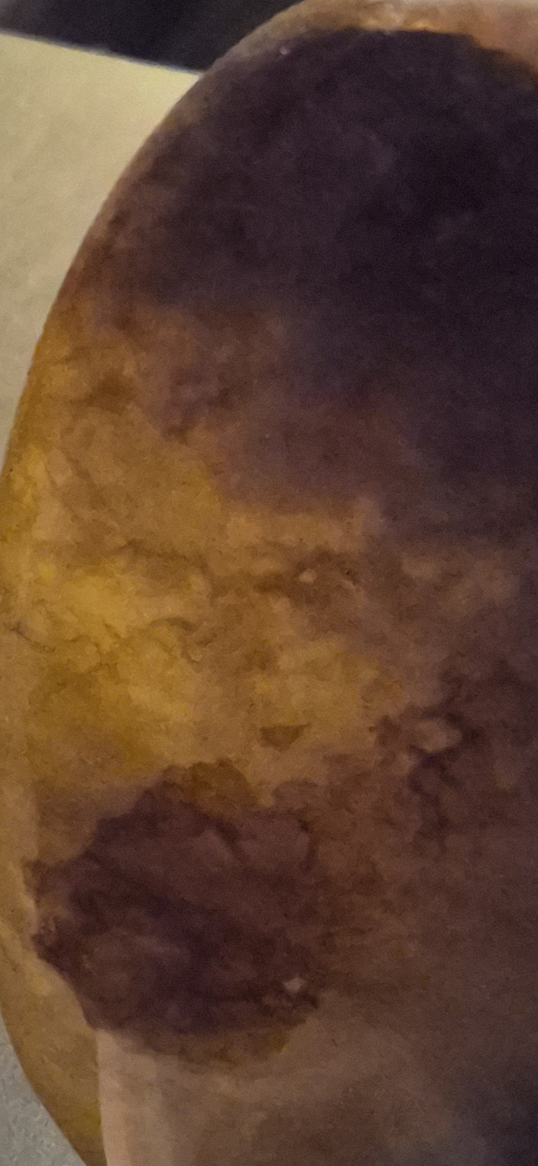 A curved surface, golden brown