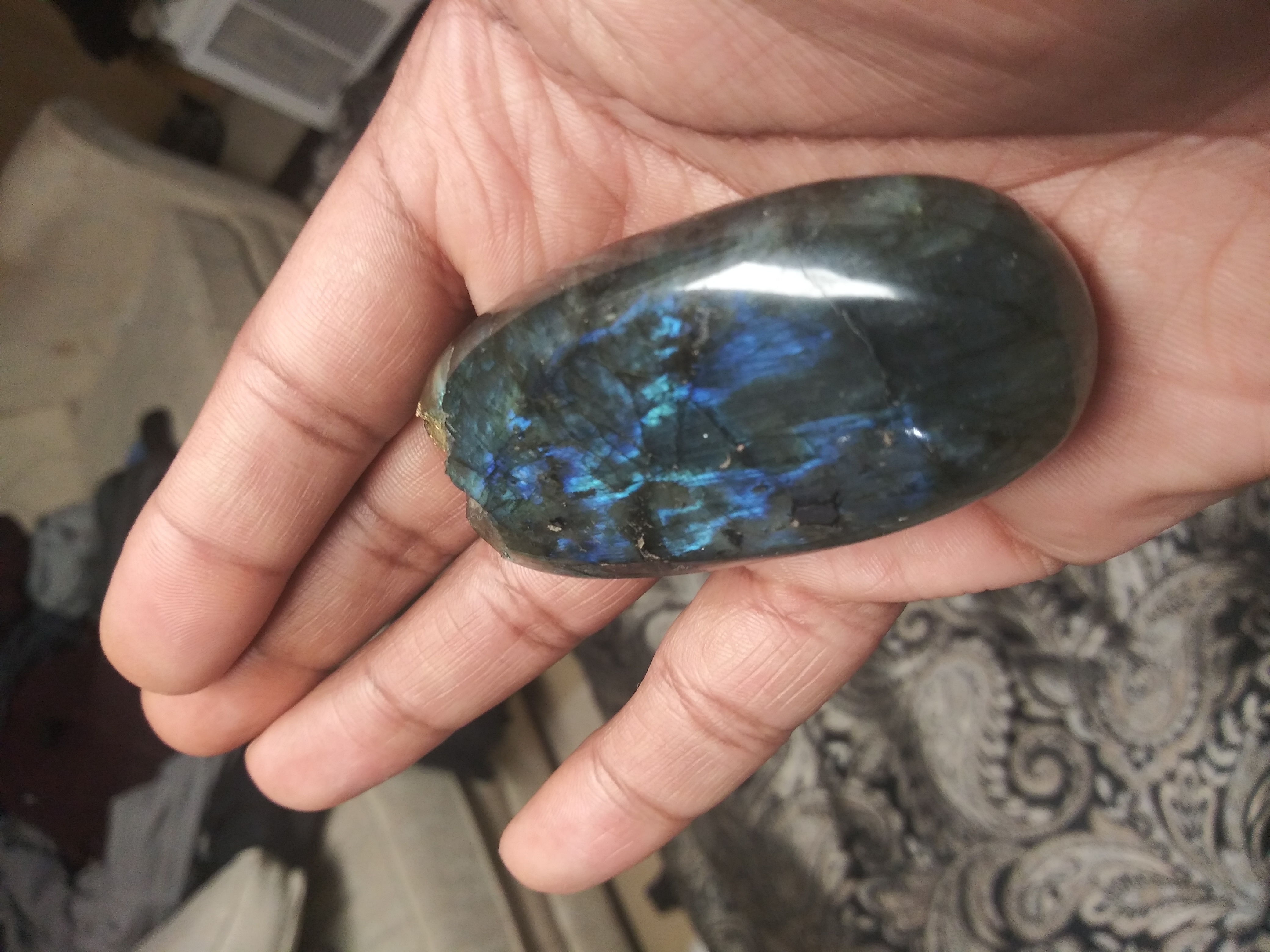 The labradorite in the open palm