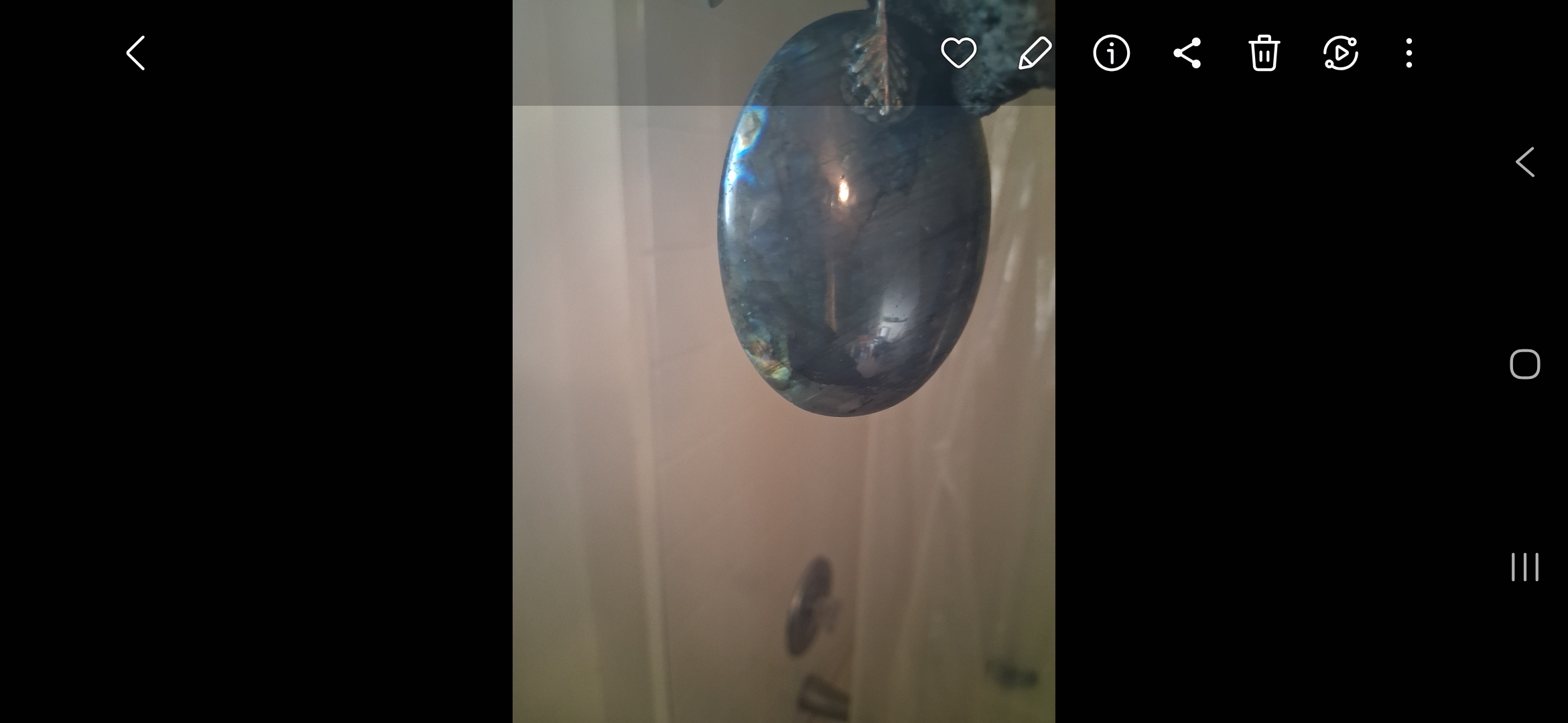 The piece in the hand, blue across it