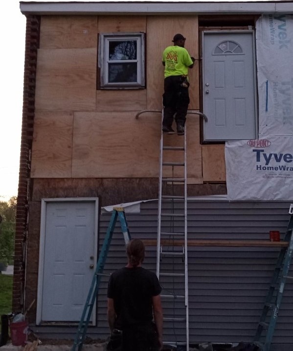 New exterior door set on the upper level