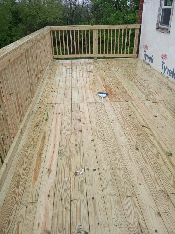 New deck and railing, back of the house