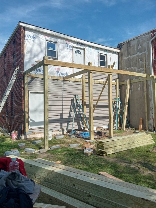 Framing against the back of the house